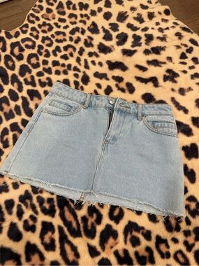 Edikted Light Blue Denim Mini Skirt with Raw Hem